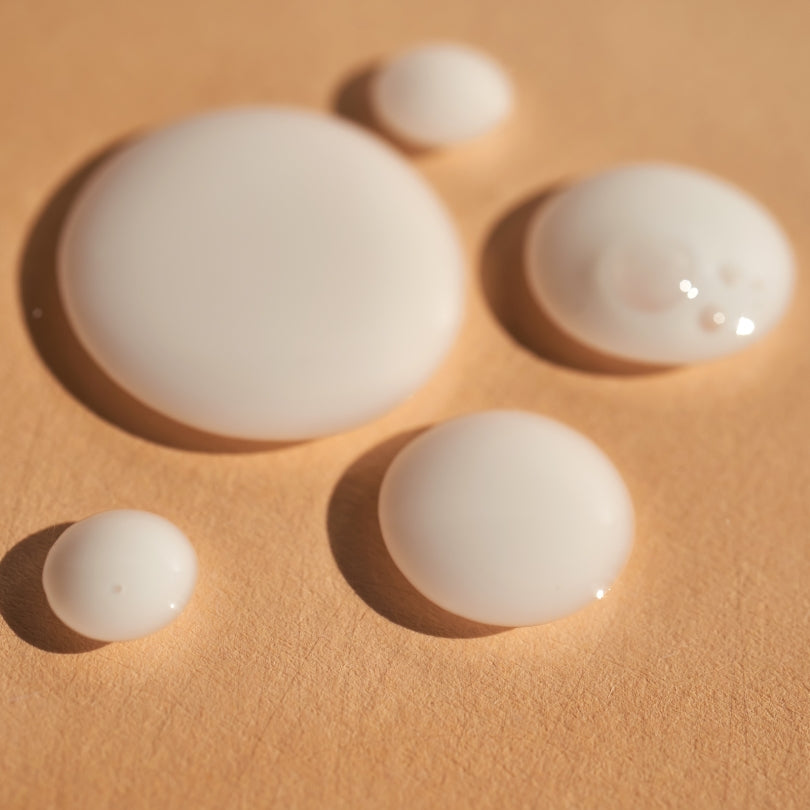 macro skincare serum droplets texture representing niacinamide hydration